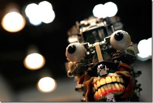 A humanoid robot, without its facial skin, is displayed at Japan's largest robot convention in Tokyo Wednesday Nov. 28, 2007. The life-size dental training robot, dubbed Simroid for "simulator humanoid," has realistic skin, eyes, and a mouth that can be fitted with replica teeth that trainees practice drilling on and cries in pain when the drilling goes wrong. (AP Photo/David Guttenfelder)