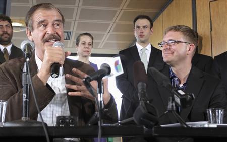 Former President of Mexico Fox talks during a news conference next to marijuana entrepreneur and CEO of Diego Pellicer Inc. Shively in Seattle, Washington