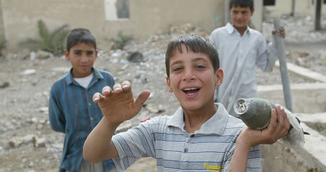 Child-with-mortar-shell