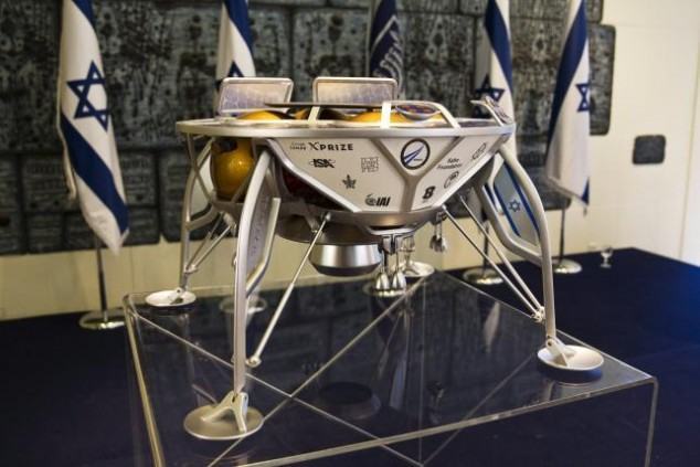 A model of an Israeli spacecraft is displayed on a podium before a meeting between Israeli President Reuven Rivlin and Israeli space team, SpaceIL, in Jerusalem October 7, 2015. REUTERS/Ronen Zvulun