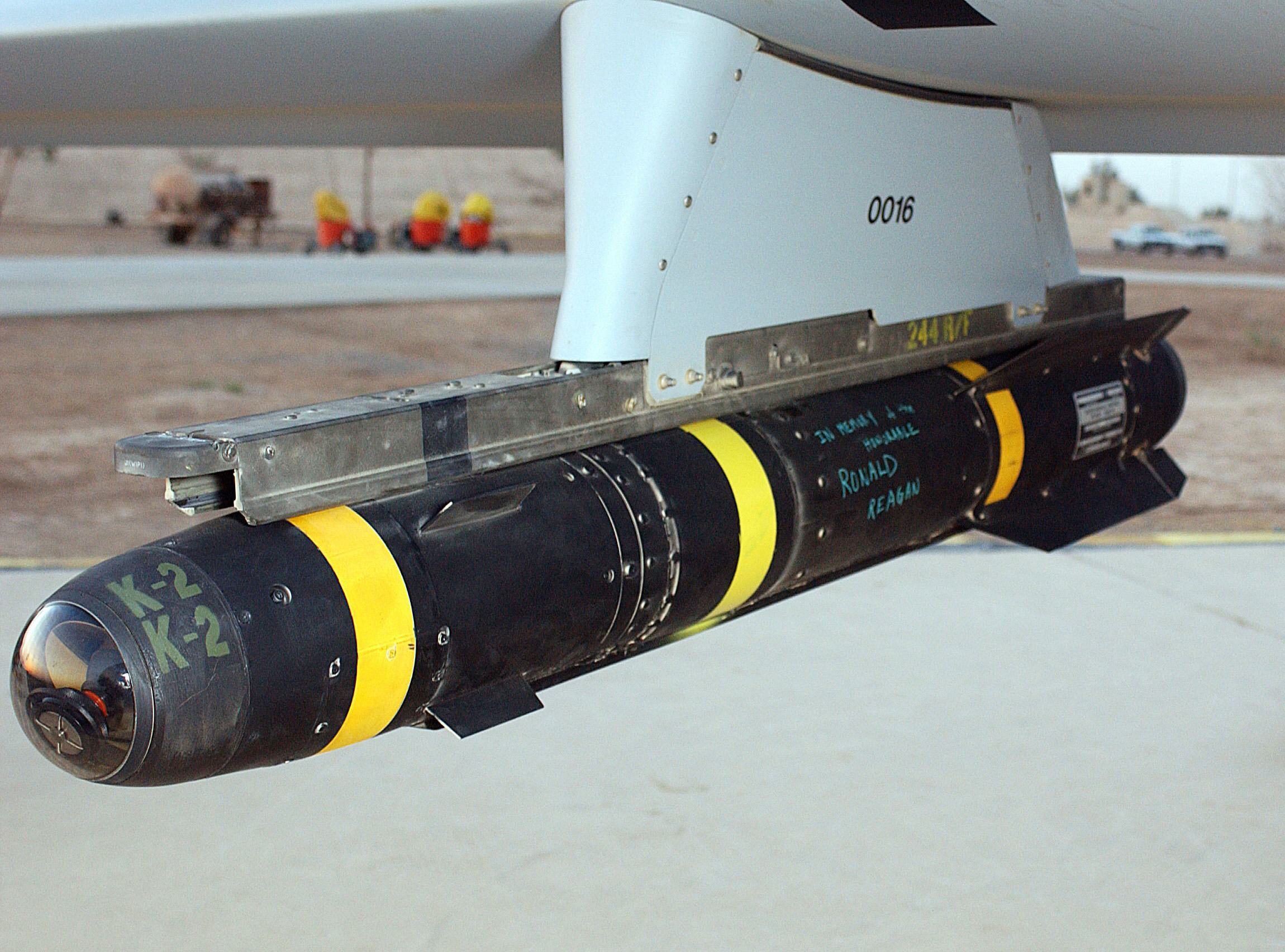An AGM-114 Hellfire missile hung on the rail of an US Air Force (USAF) MQ-1L Predator Unmanned Aerial Vehicle (UAV) is inscribed with, "IN MEMORY OF HONORABLE RONALD REAGAN."