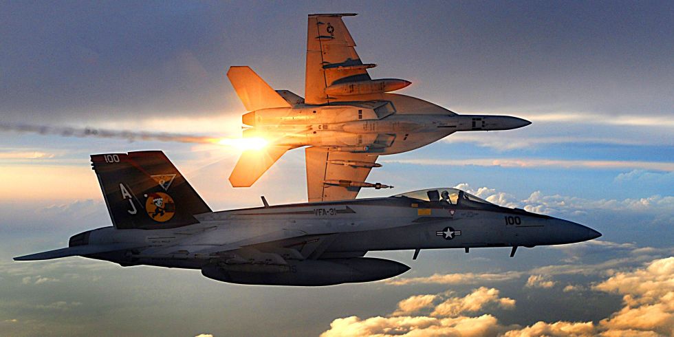 landscape-1497016928-fa-18-super-hornets-of-strike-fighter-squadron-31-fly-patrol-afghanistan-december-15-2008