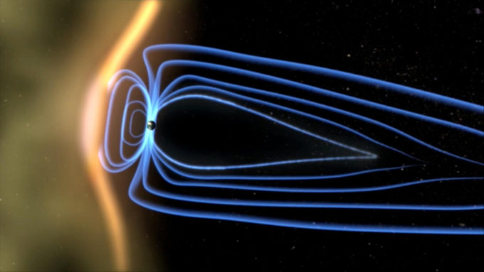 Representação artística de como o campo magnético da Terra protege o planeta dos ventos solares (Crédito: Reprodução/PBS)