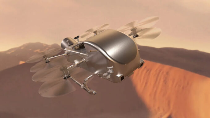 Representação artística do drone Dragonfly, em ação nos céus de Titã (Crédito: Steve Gribben/Johns Hopkins APL/NASA)