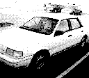 Foto de um carro tirada com uma Game Boy Camera.